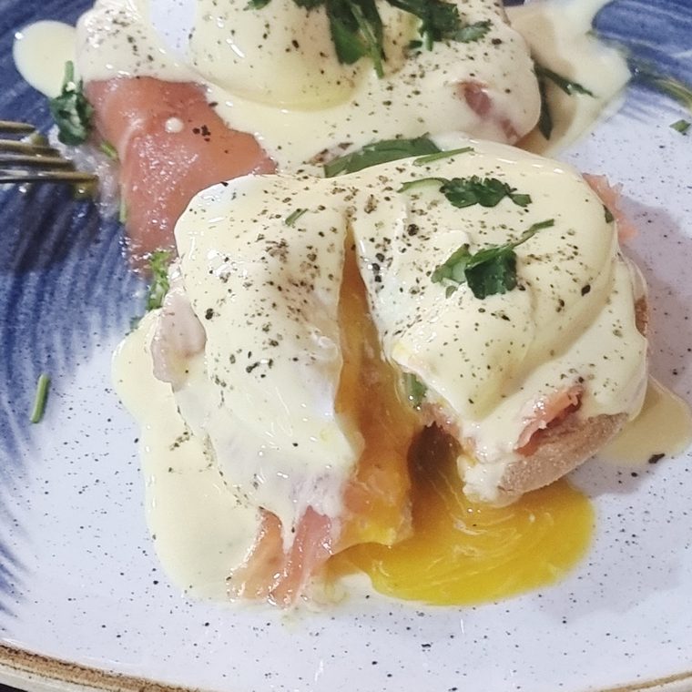 Eggs benedict royale with smoked salmon and hollandaise